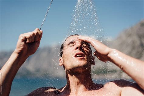 man showering naked